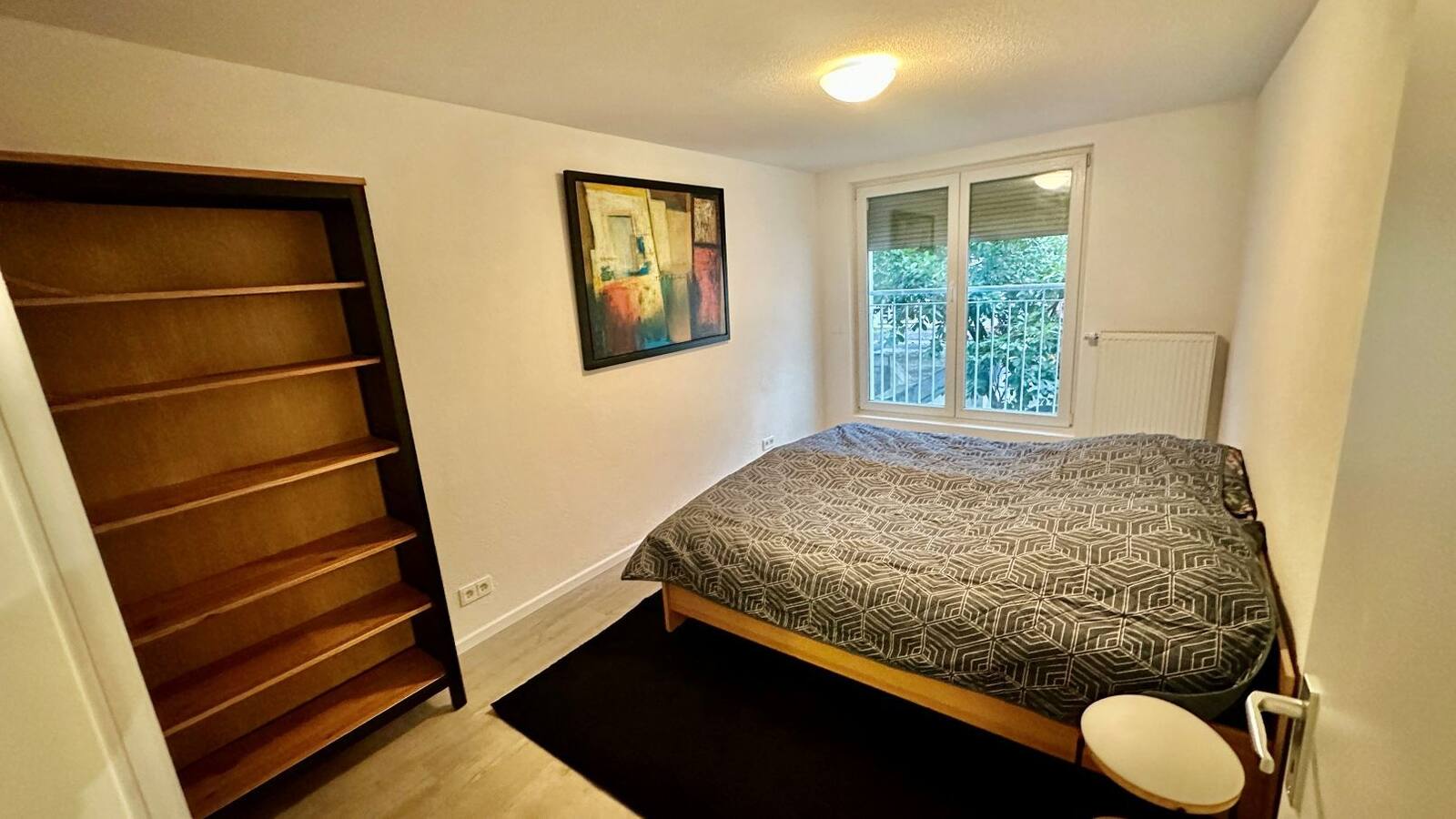 Schlafzimmer 2 mit Kingsize-Bett